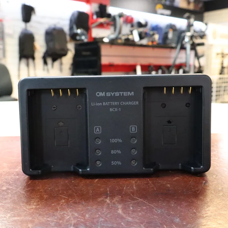 Used OM System BCX-1 Dual Battery Charger - 12 Months Warranty