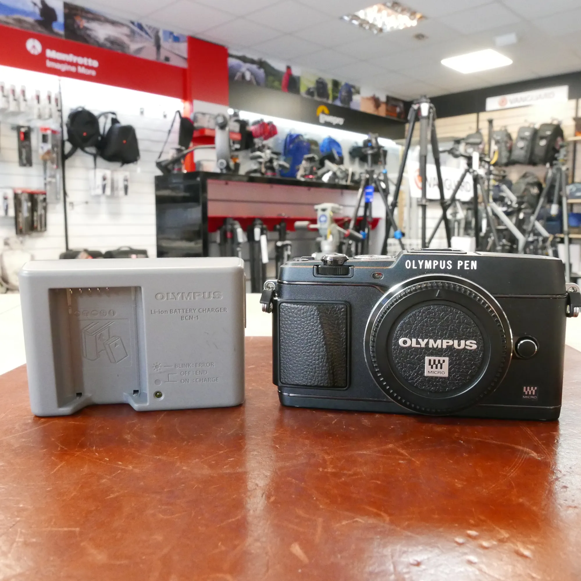 Used Olympus Pen E-P5 Body - Black - 1237 Actuations - 1 Used Olympus Pen E-P5 Body - Black - 1237 Actuations - 1
